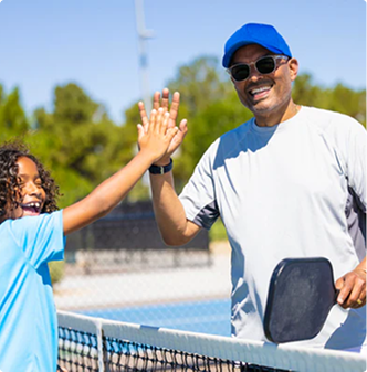 APL player with a custom pickleball paddle