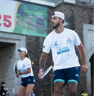 APL player with a custom pickleball paddle